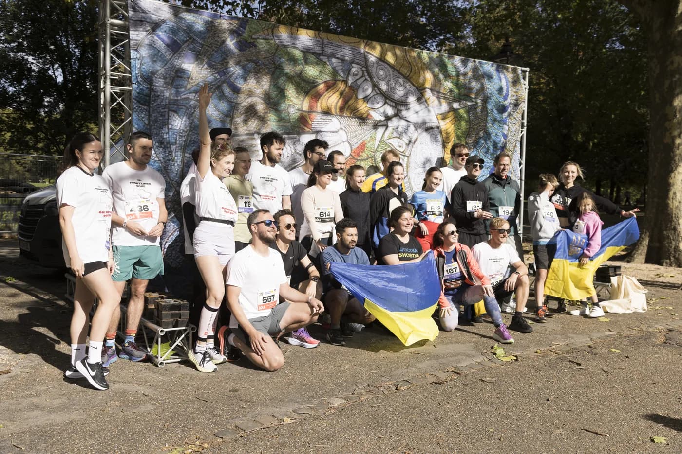 Freedom Runners in front of the Boryviter mosaic at Freedom Run 3.0